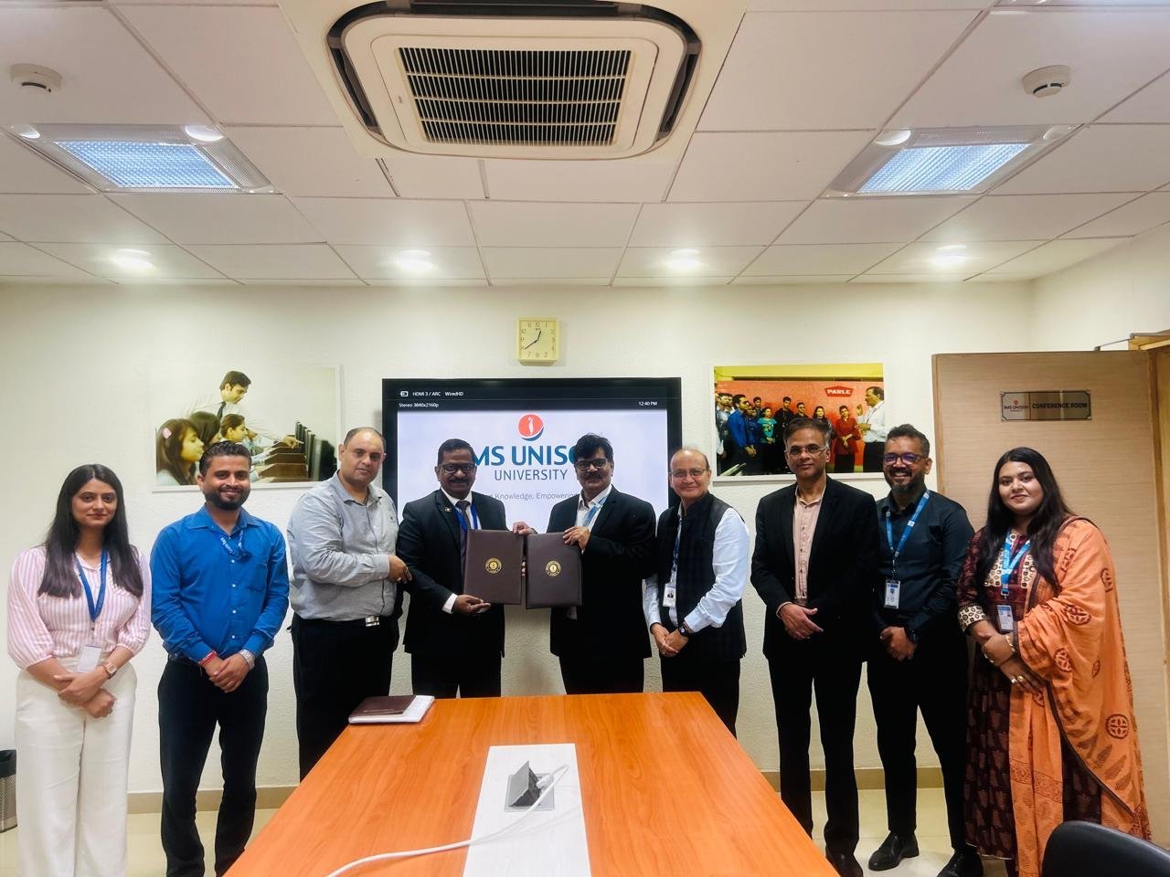 यूजीबी और आईएमएस विवि के बीच वित्तीय सहायता के लिये करार